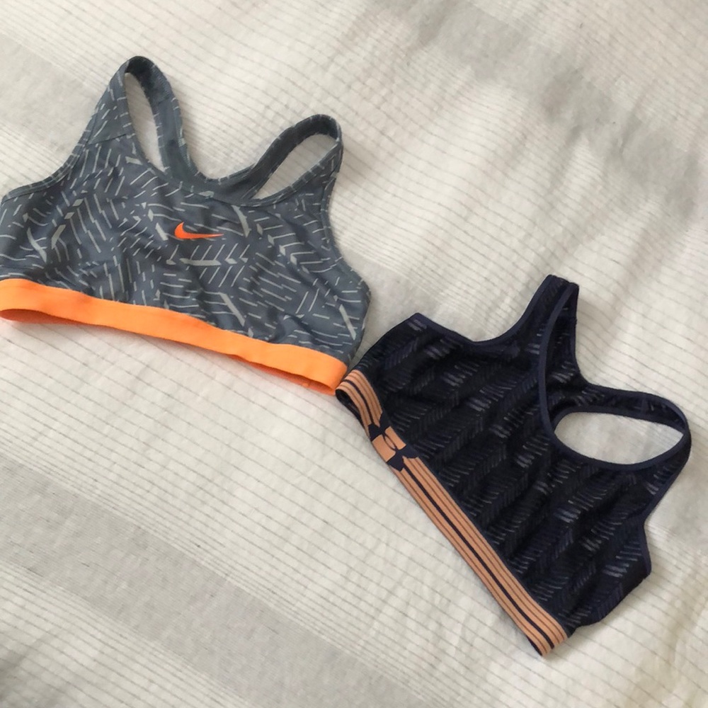 Two pack. Nike and Under Armour sports bras. Size L.